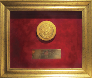 Gold Medal—Academy of Arts, Sciences & Letters, Paris, France: Presented to L. Ron Hubbard for the complete body of his literary works and achievements.